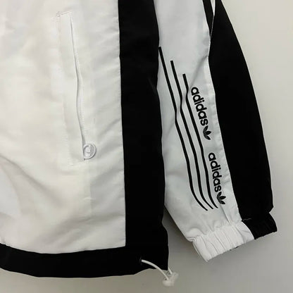 Campera rompeviento Adidas. 90minutos